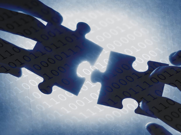 Two puzzle pieces fitting together to show JavaScript protection after the normal build is finished